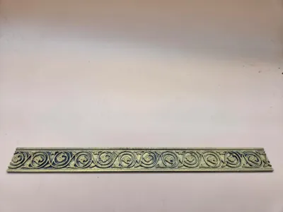 Baroque decorative molding with scroll ornament