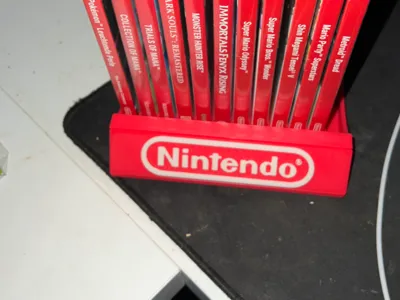 Switch game stand with switchable faces