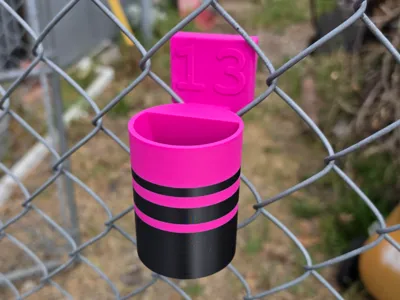 Seed Spitter that hangs on fence