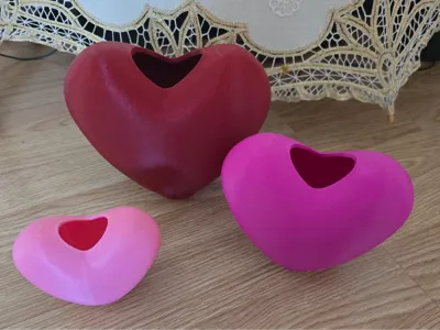 Hand and Heart filling Heart Shaped Vase