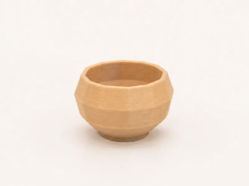 A bowl and tableware suitable for a dollhouse.