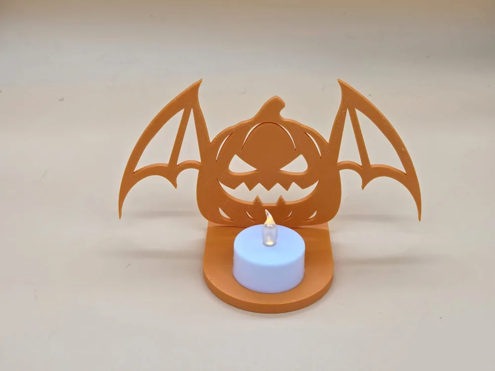 Halloween Shadow Play Pumpkin Tealight - Free 3D Print Model - MakerWorld
