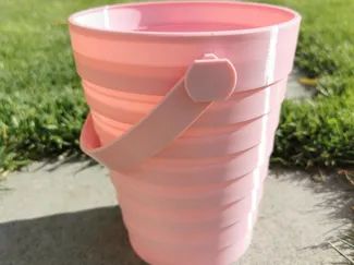Collapsing bucket (print in place)