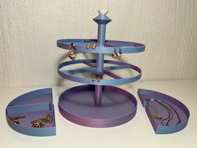 Rotating earring and jewellery holder