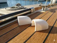 Marine fender end caps with screw hole