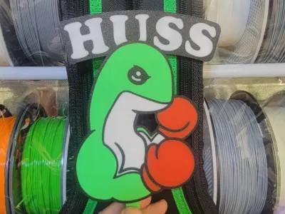 Team Huss Nessie Sign and Necklace