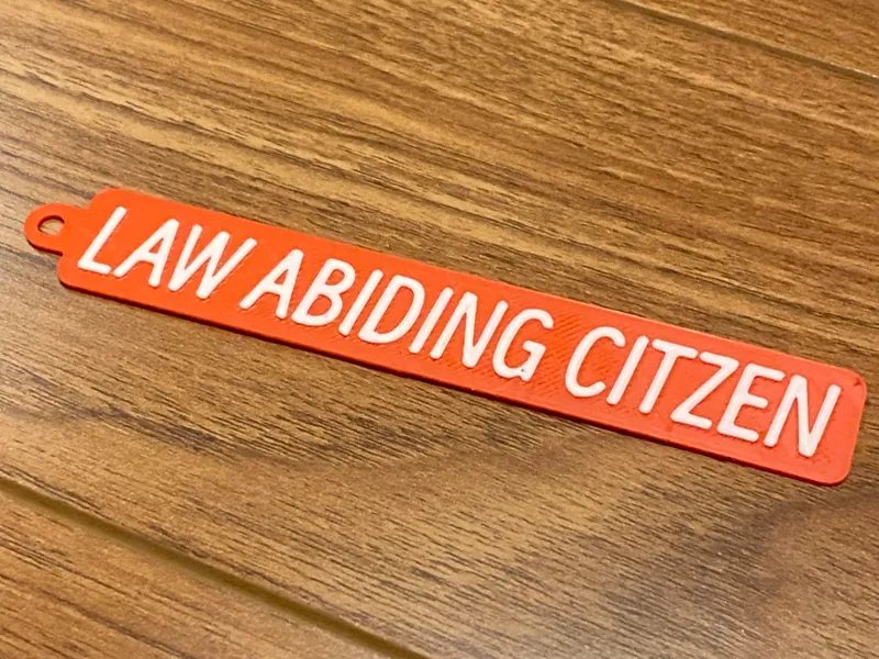 LAW ABIDING CITIZEN - Jet Tag Keychain