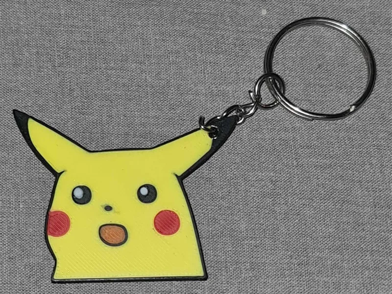 Keychain of Picachu face meme