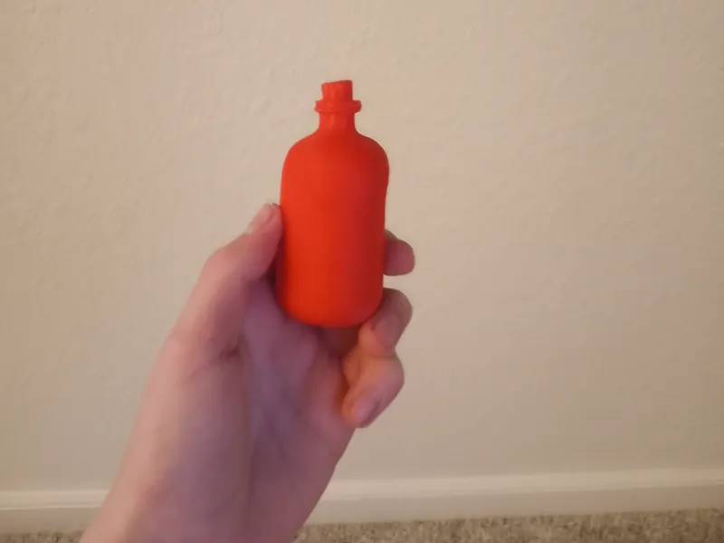 mini bloodborne blood  vial