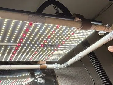 Pipe hanger from grow light