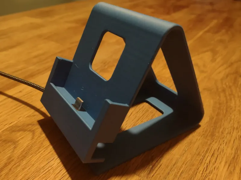 Phonedock with charing cable duct