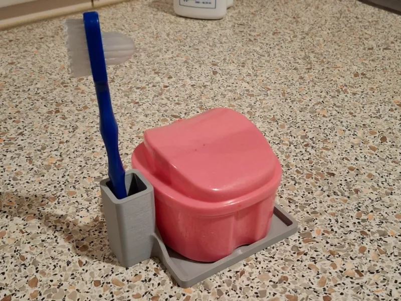 Denture box and denture brush holder