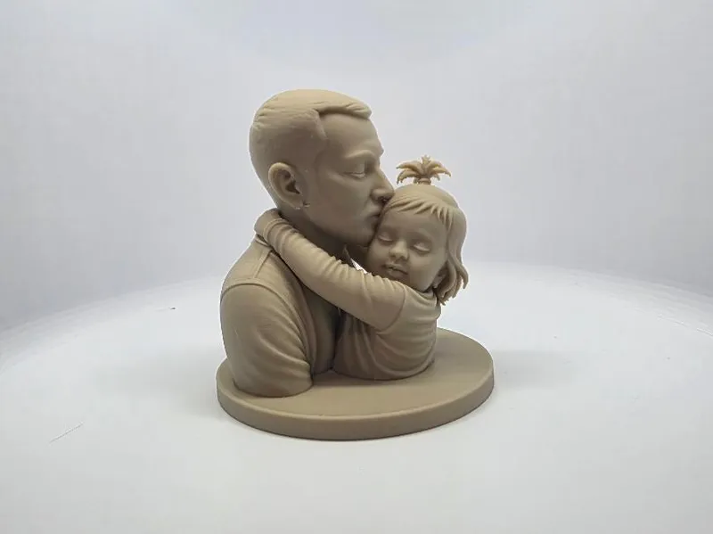 A Father's Love - Father and child sculpture