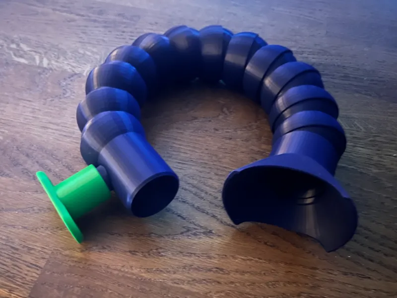 wall mount for flexible vacuum hose MFT