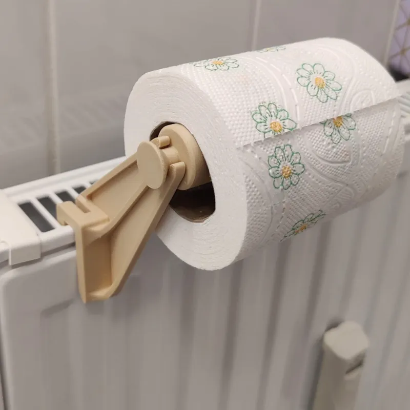 Radiator toilet paper holder