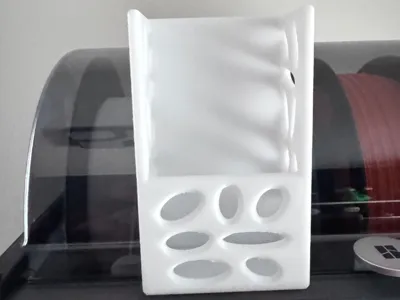Modern Remote Control Holder with Oval Design