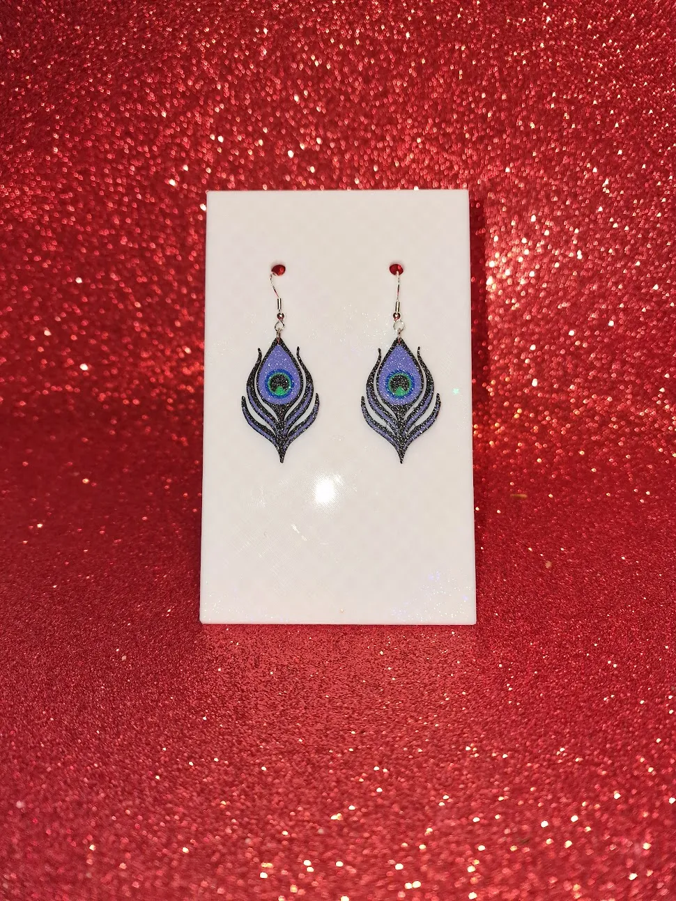 Peacock feather earrings view 2