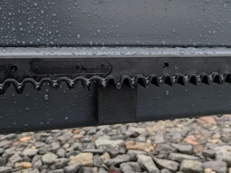 Toothed rack cover for entrance gate.