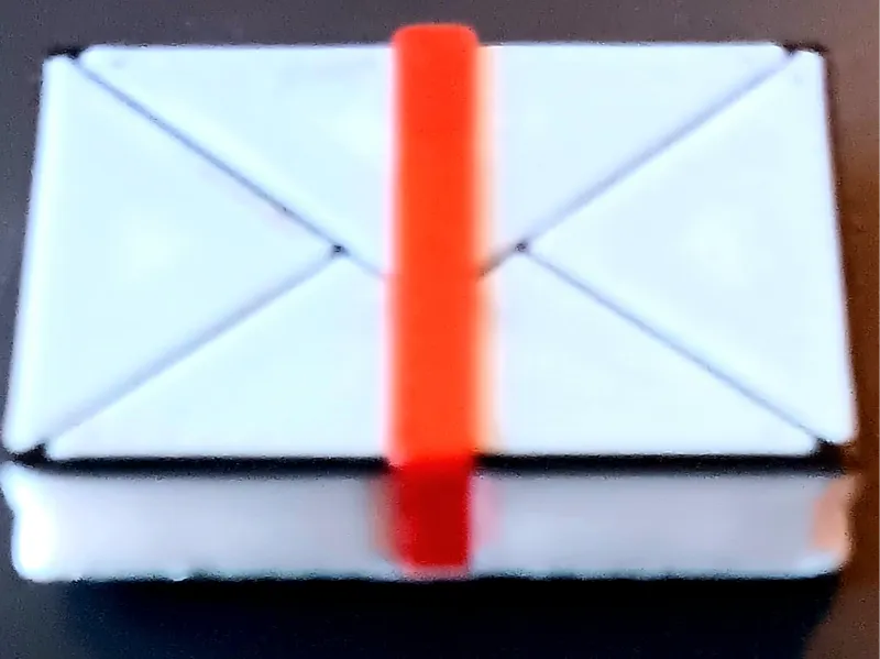 Envelope stack fridge magnet.