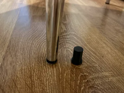 Footer for metal table legs