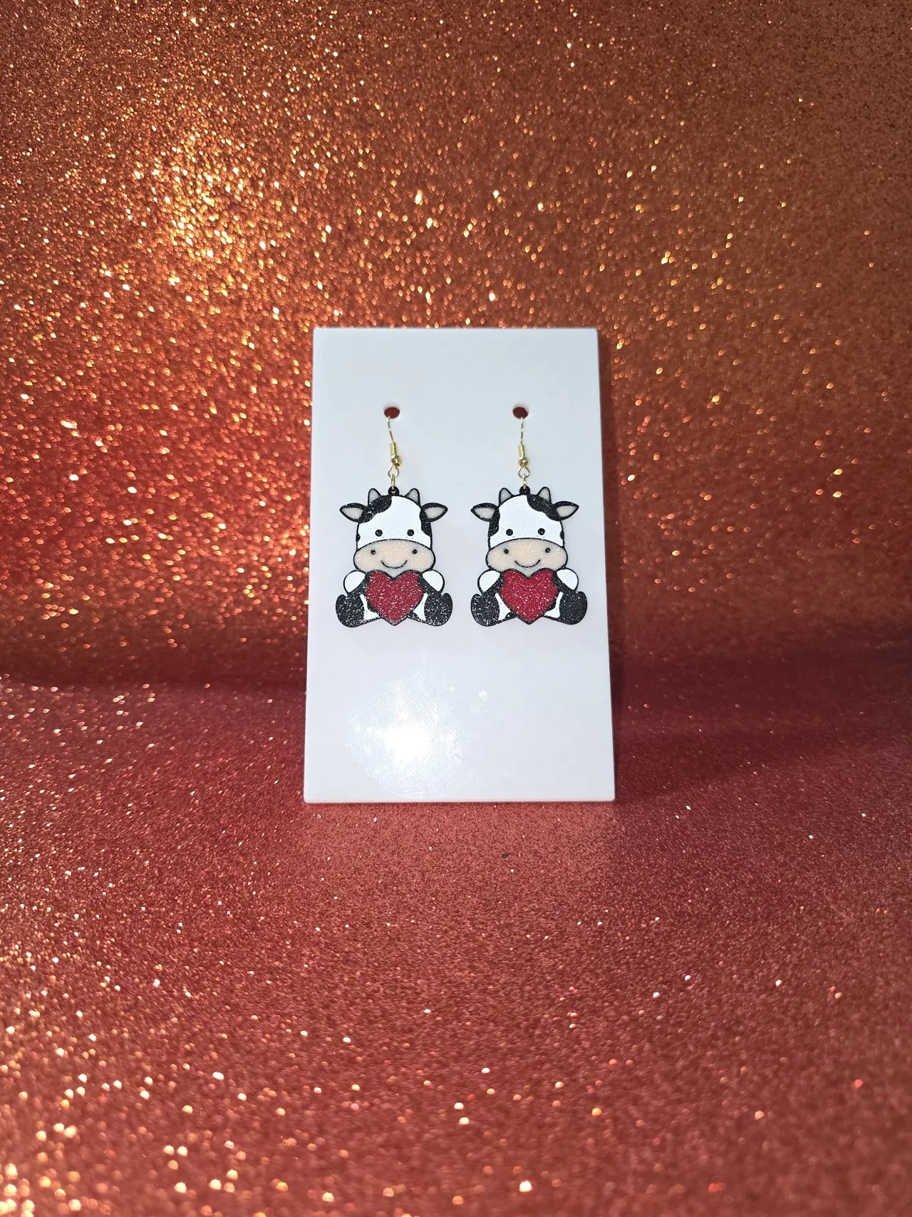 Cow in love earrings view 2