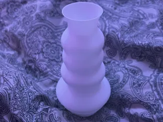 a small curvy vase