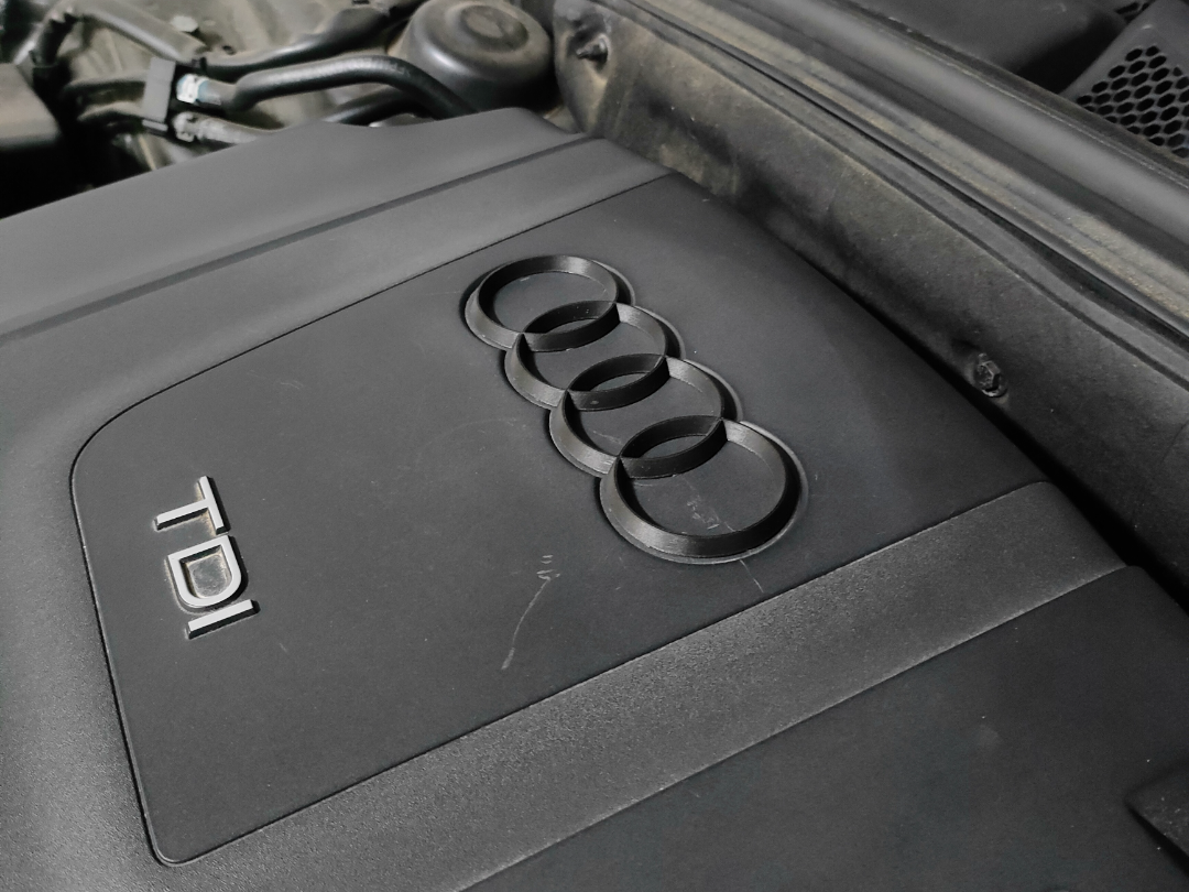 Audi A4 B8 engine cover emblem
