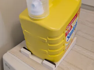 Stand up angled laundry detergent stand