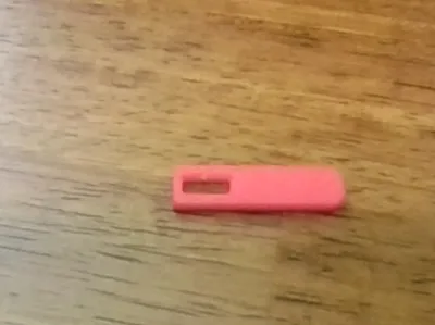 Zipper Pull Tab.