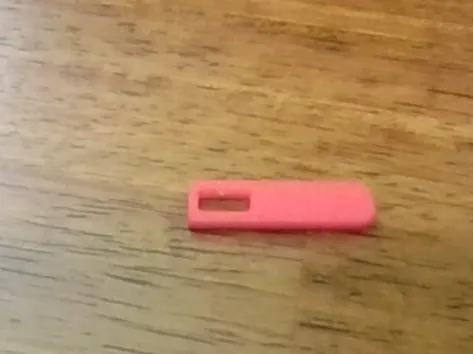 Zipper Pull Tab.