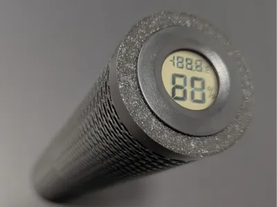 Desiccant tube for storage totes and dry boxes