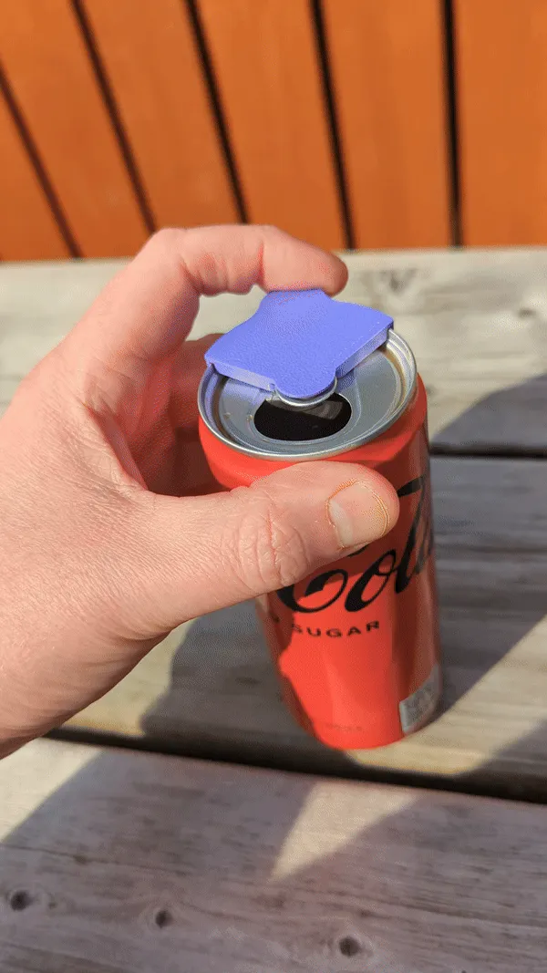 Drinks can cover/opener view 2