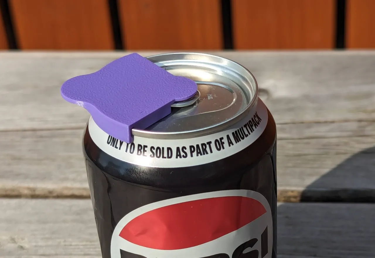 Drinks can cover/opener view 3