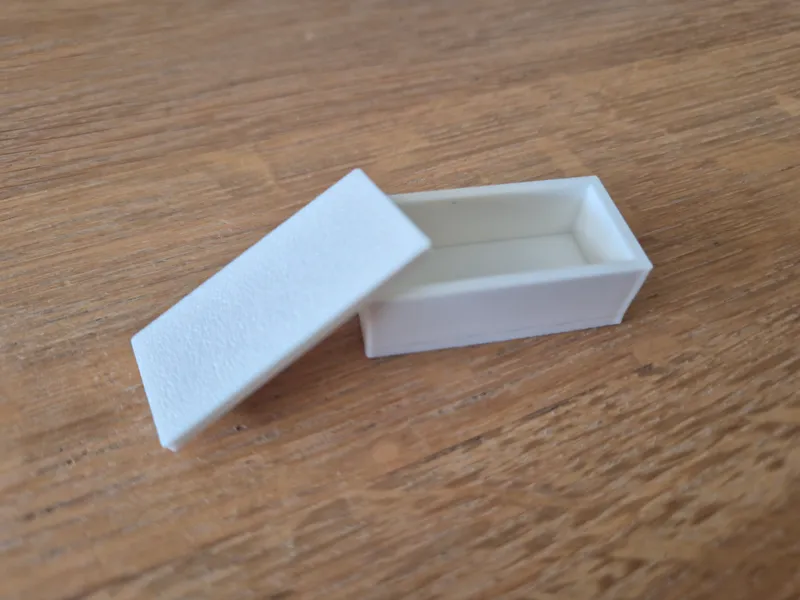 Miniature box with recessed top