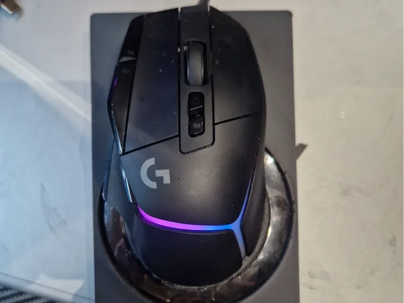 Logitech g502x plus qi charging pad
