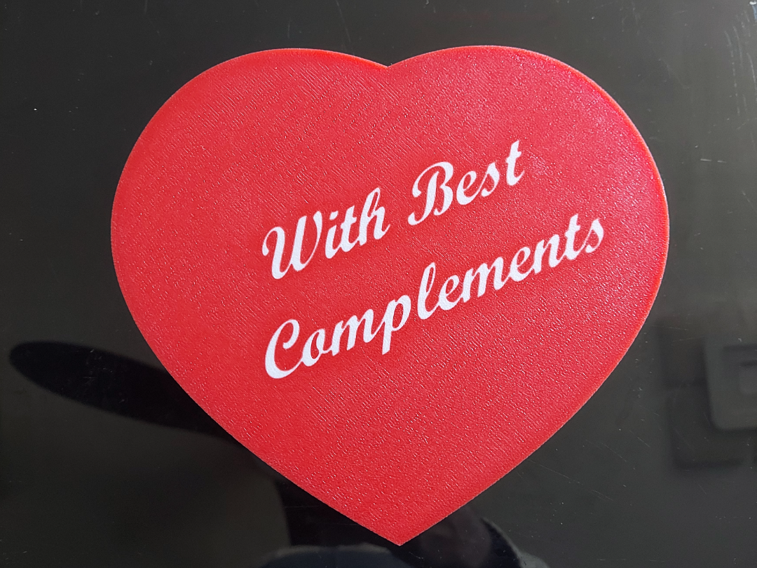 Heart-Shaped Gift Box: "With Best Complements"