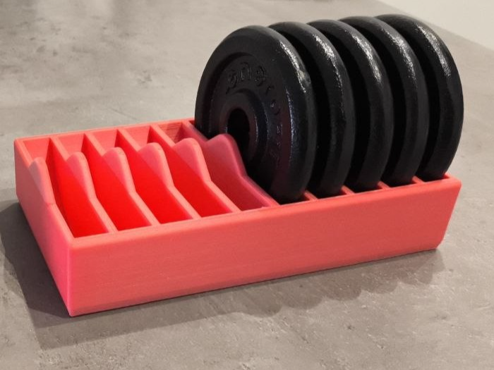 Stand for storing dumbbell weight plates.