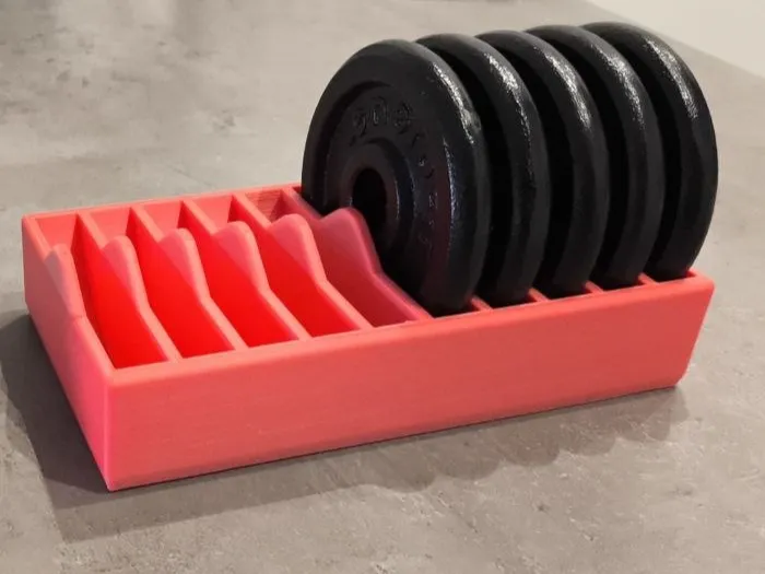 Stand for storing dumbbell weight plates.