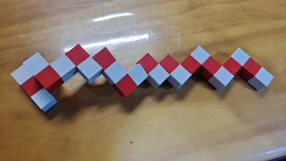 The Spirit of Luban's Snake Cube - Free 3D Print Model - MakerWorld