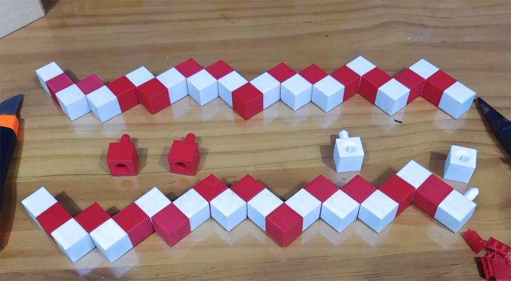The Spirit of Luban's Snake Cube by 乐光荣 MakerWorld: Download Free 3D Models
