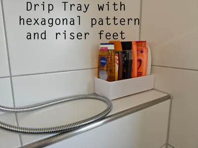 Shower drip tray with hexagonal pattern and riser