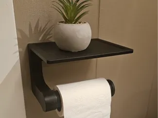Wall mounted toilet paper roll holder
