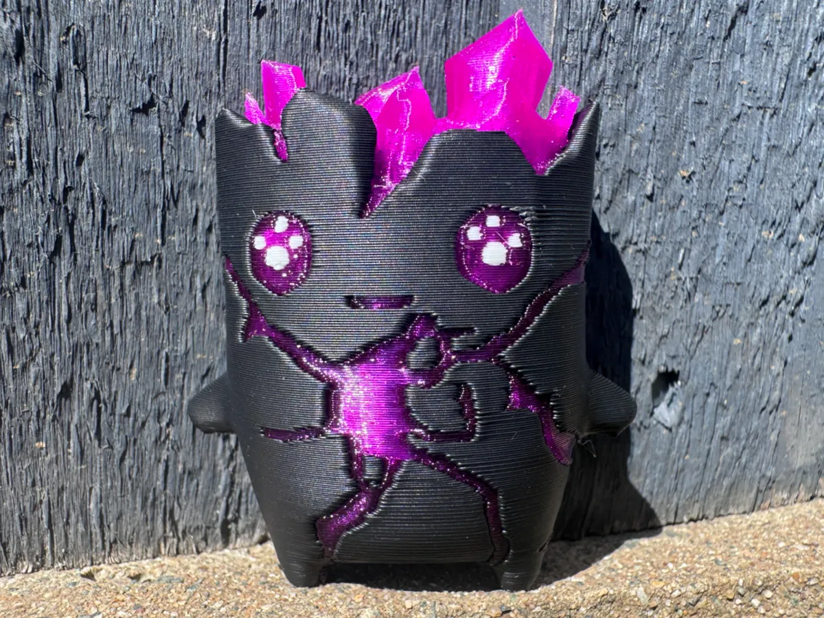 3D printed Fortnite Zero Point sprite figure in black with magenta crystals