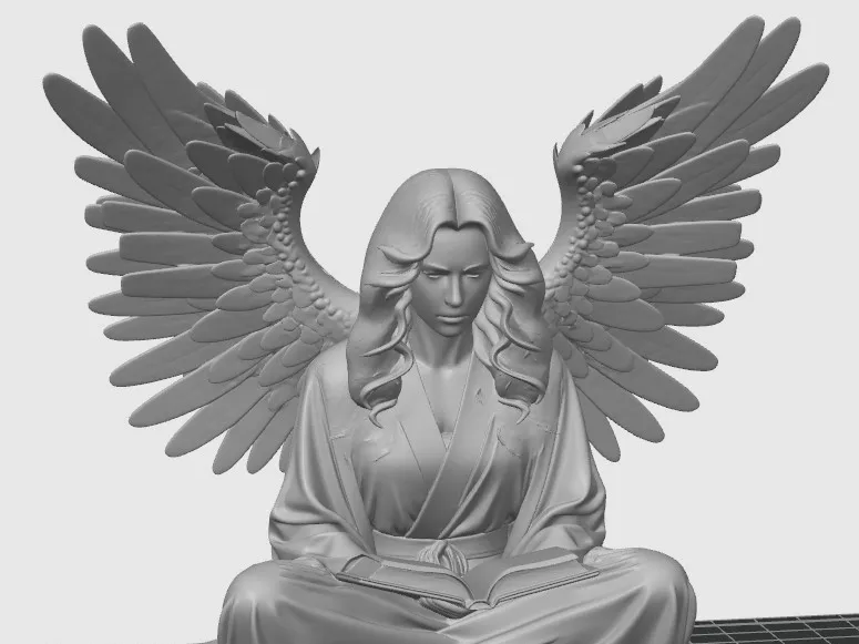 Reading angel statue