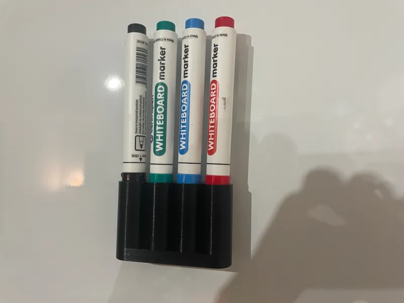 Magnetic whiteboard marker holder