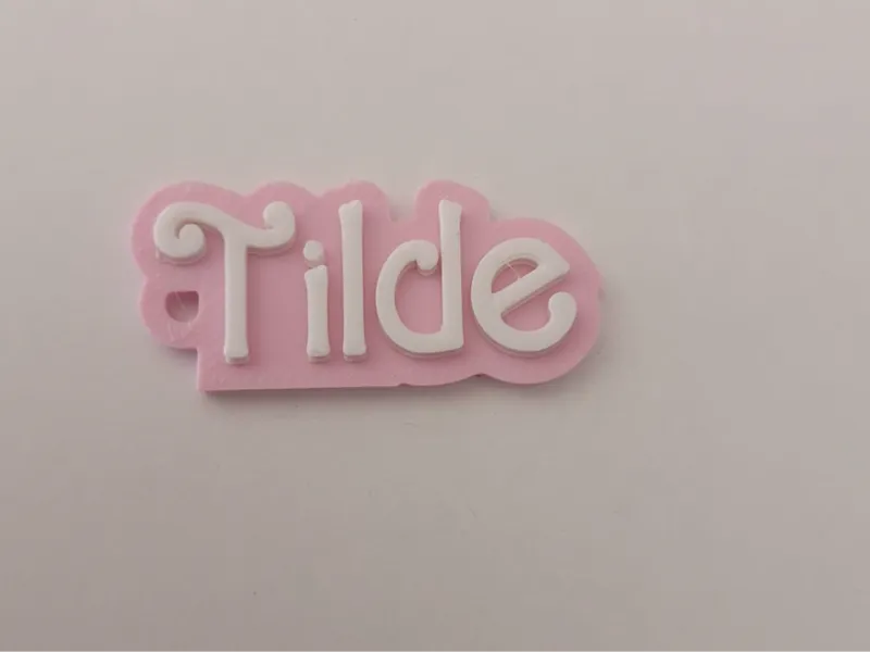 Tilde