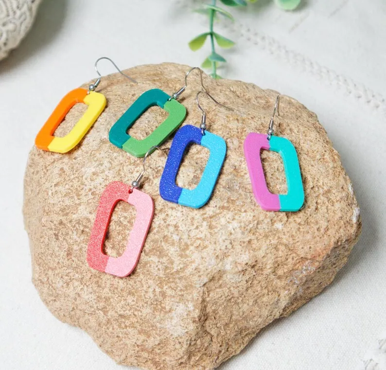 Pendientes geométricos bicolor view 2