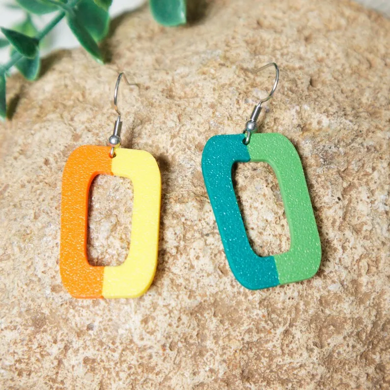 Pendientes geométricos bicolor view 4