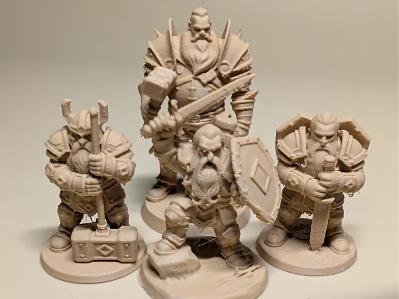 3 Dwarf and 1 Human warriors dnd sizes