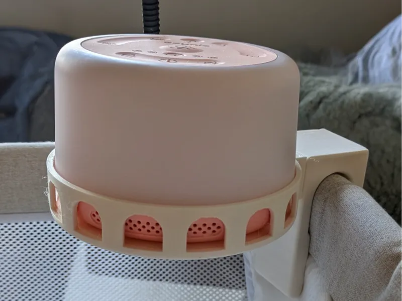 Baby white noise machine crib attachment